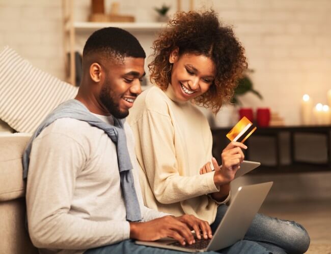 Couple Buying Gift Cards Online