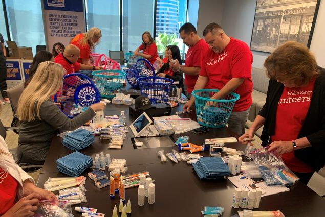 Wells Fargo employees creating hygiene kits