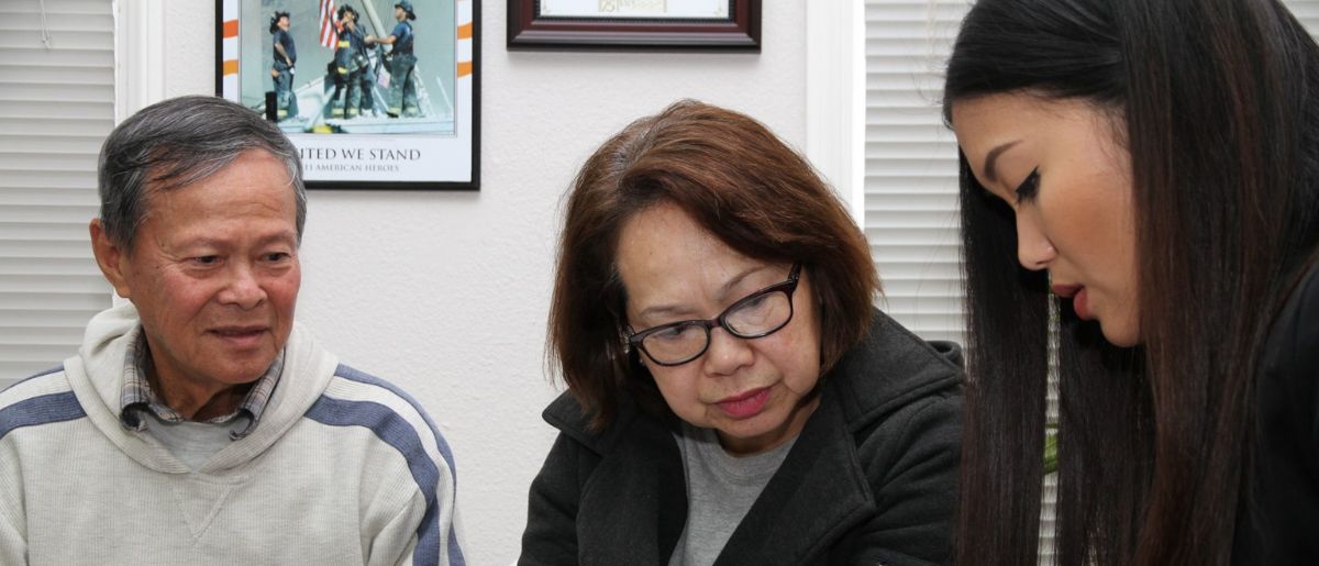 Orange County residents with a VITA volunteer receiving tax prep assistance via Orange County United Way's OC Free Tax Prep program.